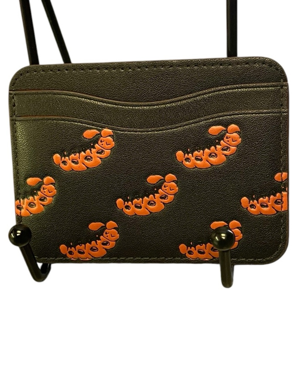 Coachtopia Black Card Holder with Playful Orange Caterpillar Motif